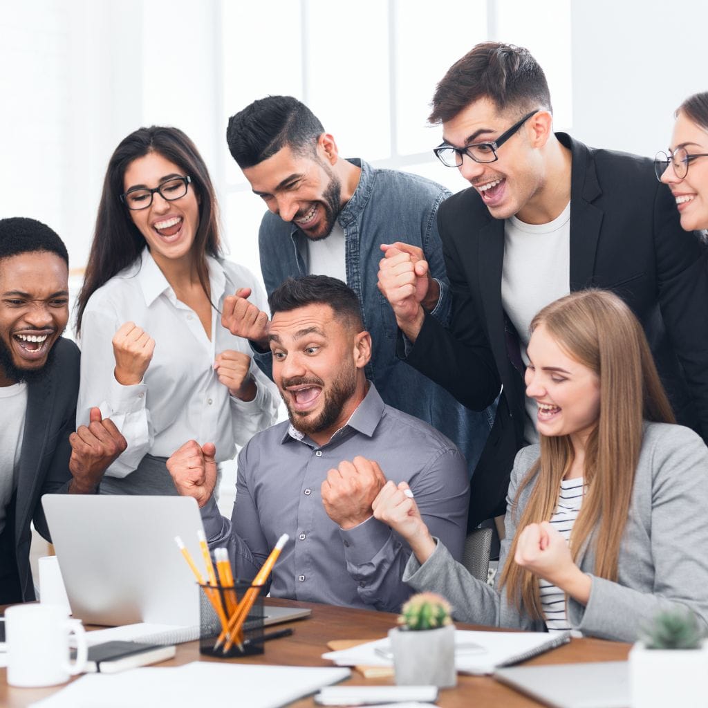 group of people celebrating technology